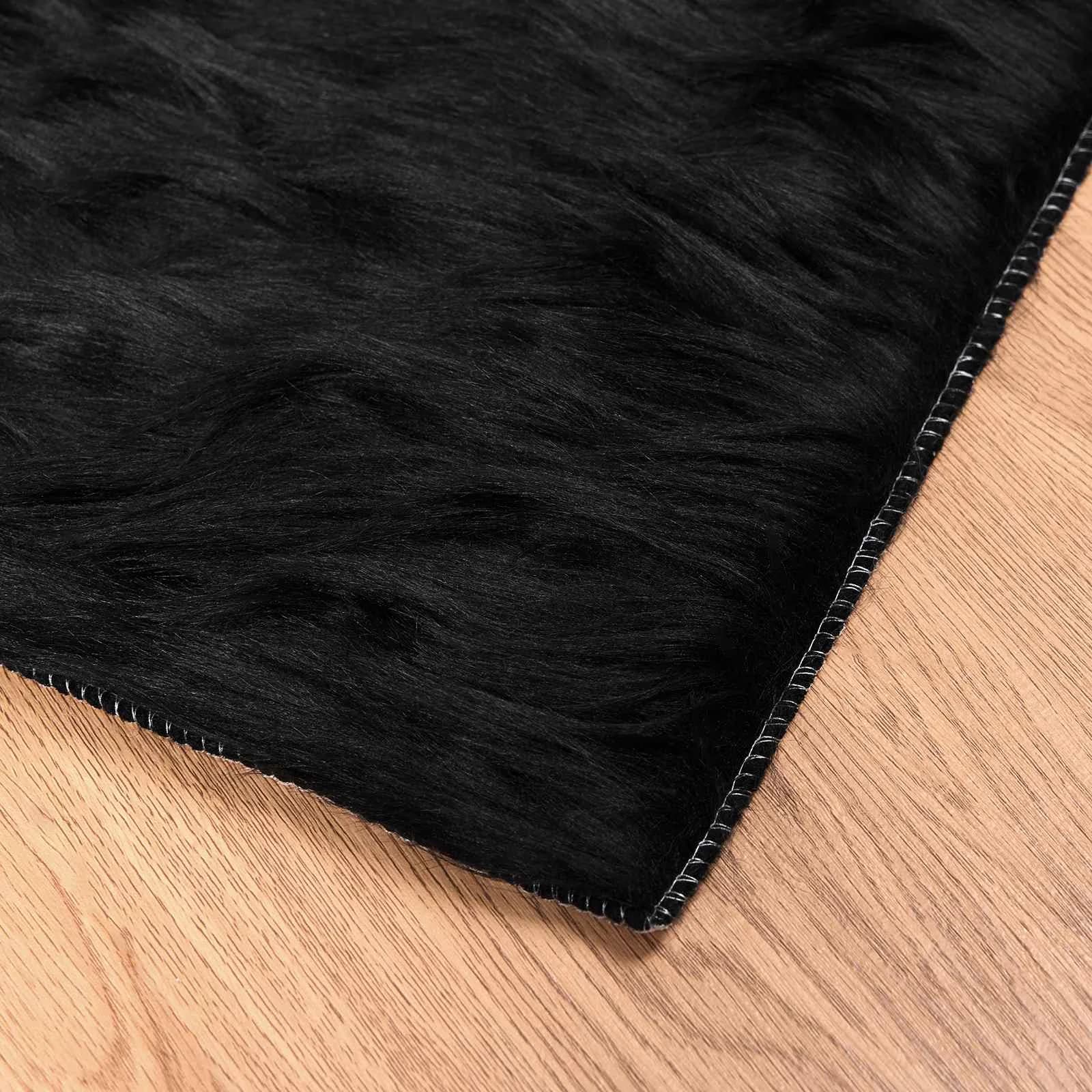 Preproga iz umetnega ovčjega krzna TAFALLA Črna 120 x 170 cm - slika 6